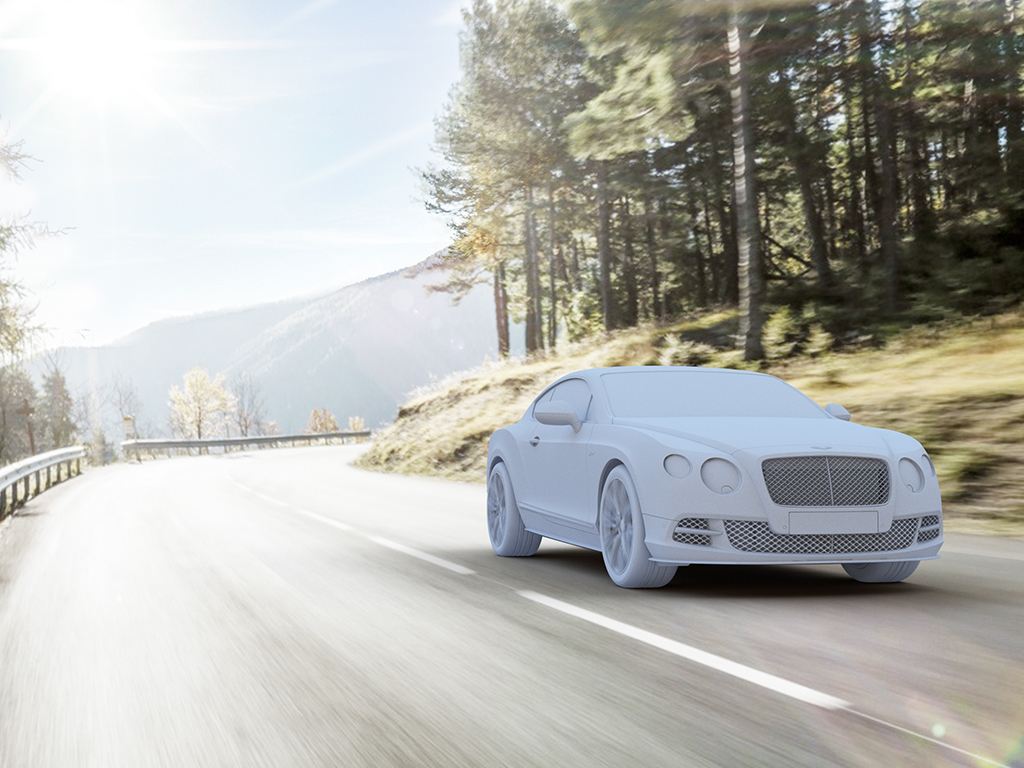 Bentley Gold driving on road by trees and mountain CGI Chalk