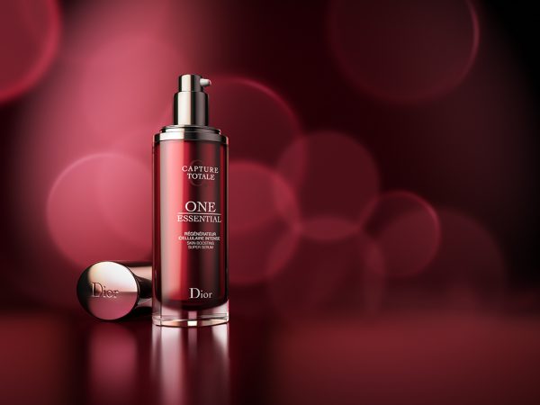 CGI Dior One Essential cream on red background