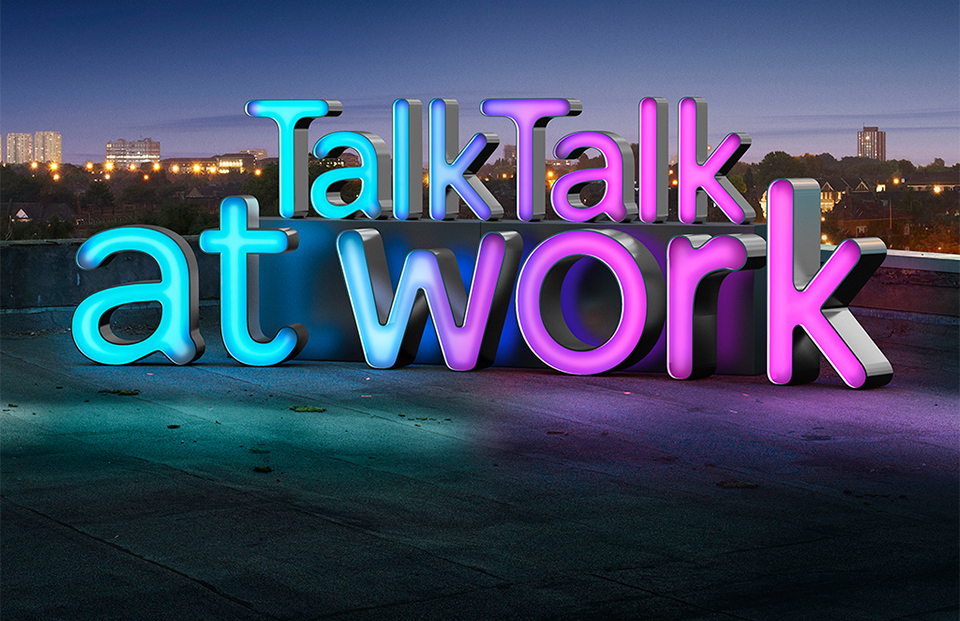 TalkTalk at work Logo in neon lights on a rooftop at night